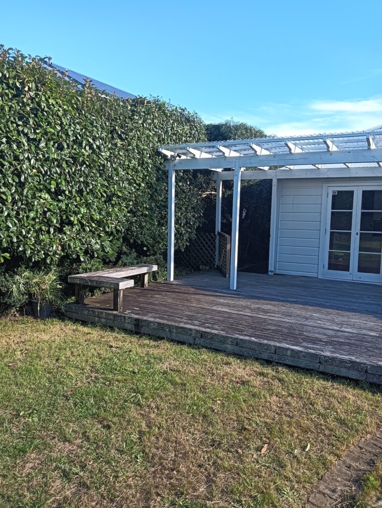 Trimmed large hedges and mowed lawns